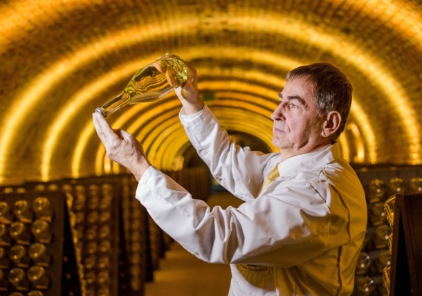     The cellarmasters constantly control the bottles to ensure the quality of the sparkling wine 
